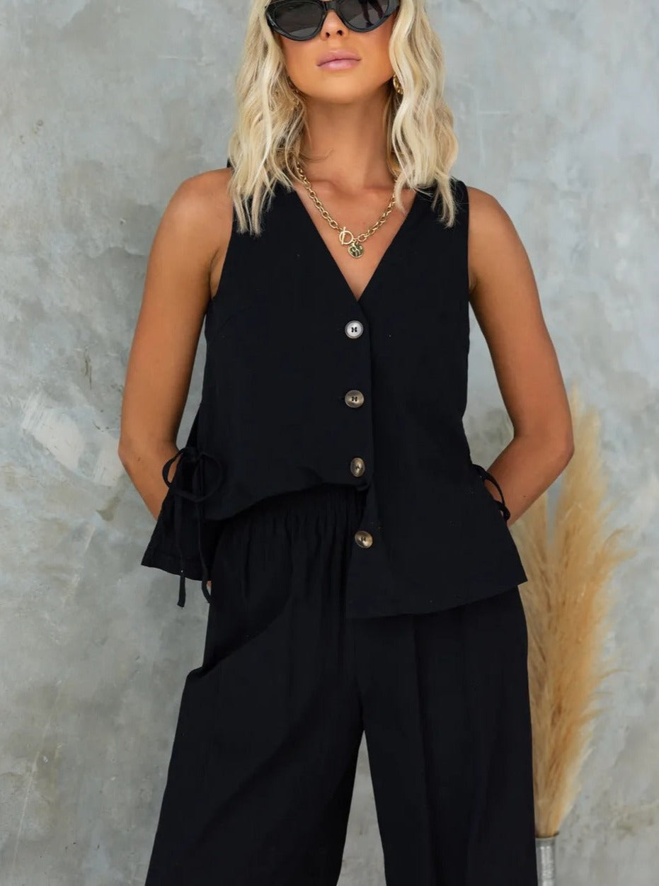 Rita - Casual jumpsuit met mouwloze effen broek met V-hals