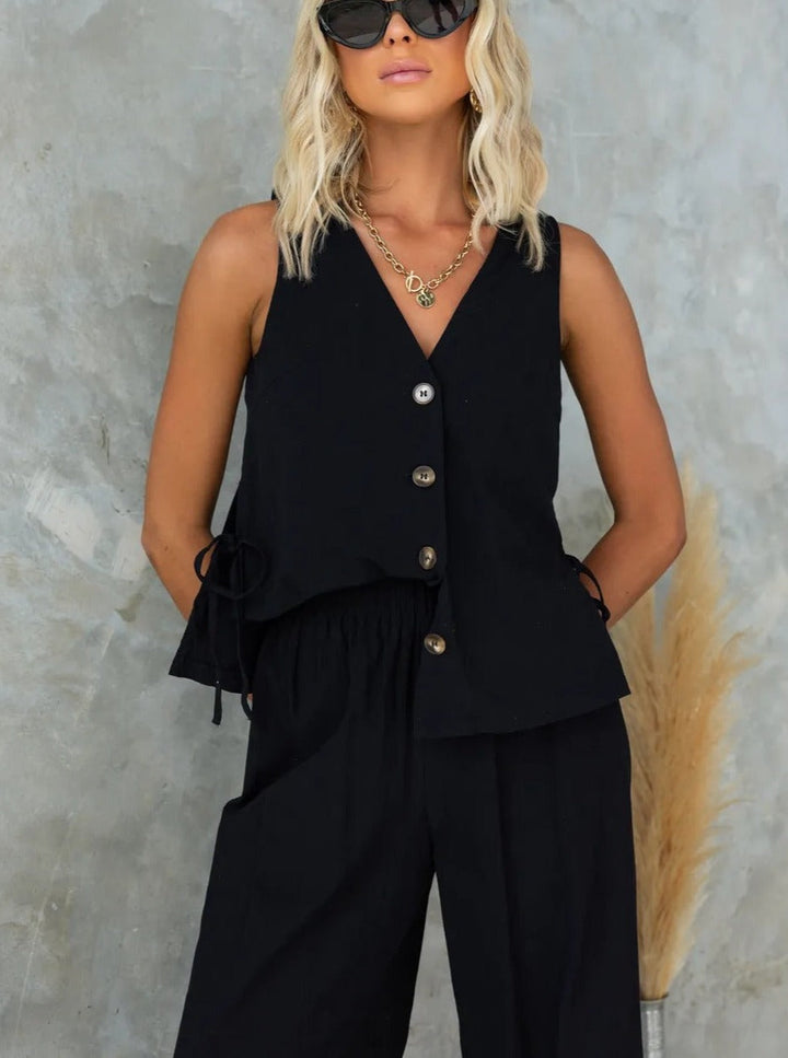Rita - Casual jumpsuit met mouwloze effen broek met V-hals
