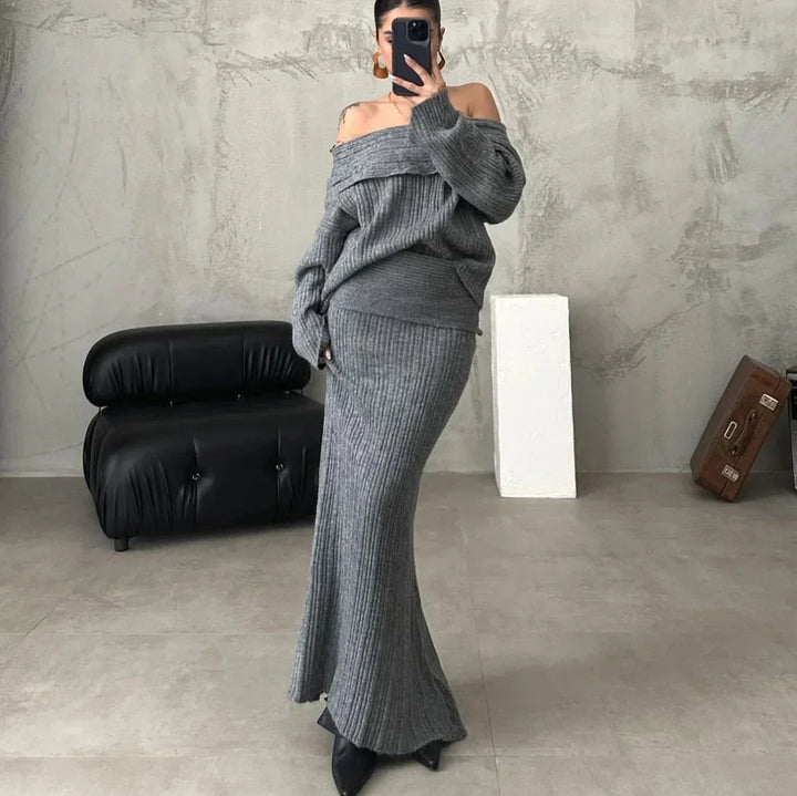 Elegante outfit met off-shoulder trui en nauwsluitende gebreide rok, perfect voor een verfijnde en vrouwelijke look