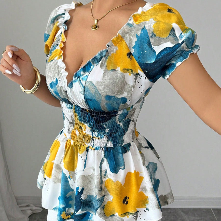 Damesblouse met plunging halslijn bloemenprint peplum snit - Yelina