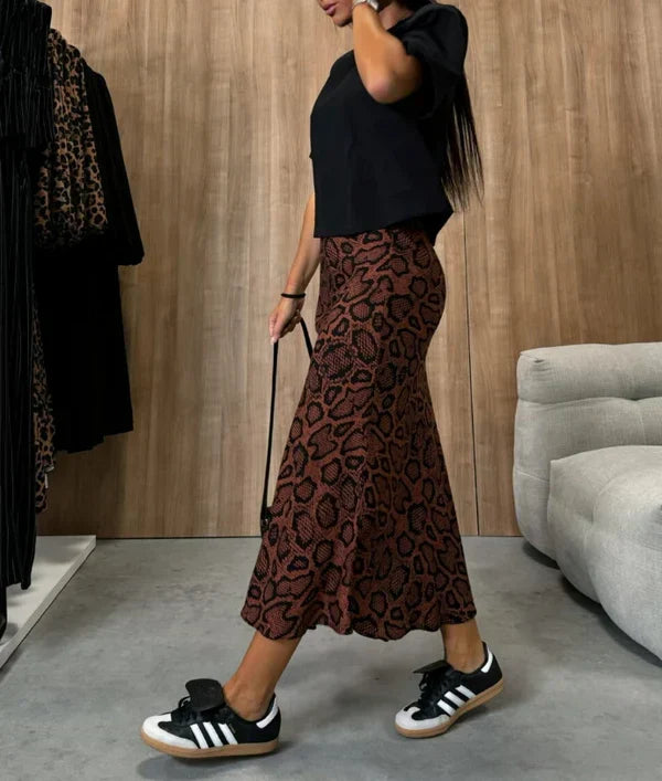 Afslankende rok met hoge taille en gedurfde en chique dierenprint, perfect voor een gedurfde en modieuze look