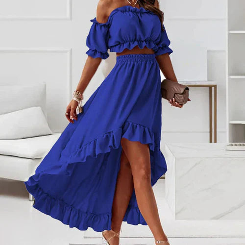 Elegante rok en top met ruches en blote schouders, perfect voor een vrouwelijke en geraffineerde look, ideaal voor speciale gelegenheden.