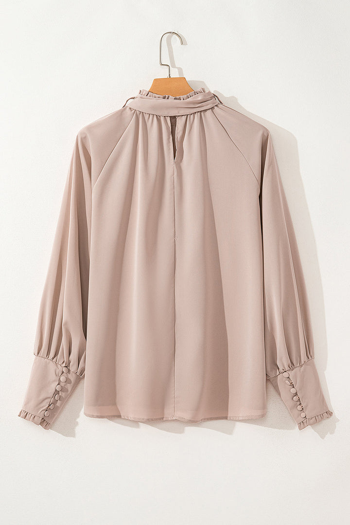 Mora - Blouse met bindceintuur en franjes en bisschopsmouwen