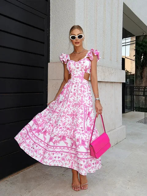 Sally - Lange roze jurk met bloemenprint