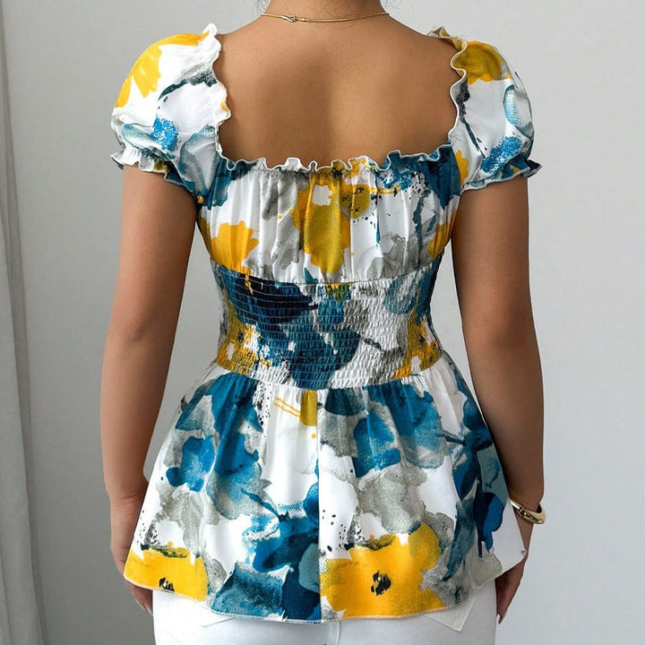 Damesblouse met plunging halslijn bloemenprint peplum snit - Yelina
