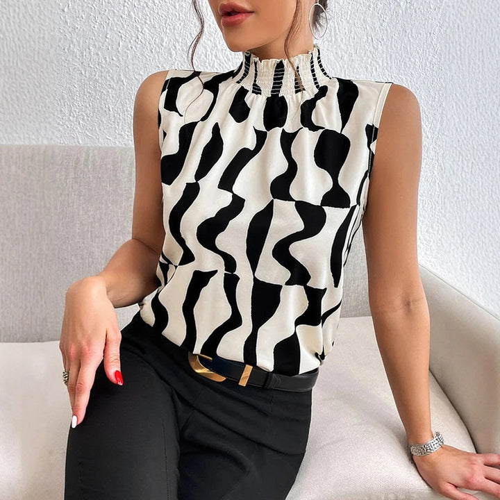 Mouwloze zwart-witte blouse met abstracte print - Renata