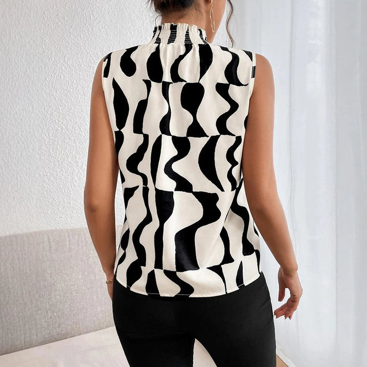 Mouwloze zwart-witte blouse met abstracte print - Renata