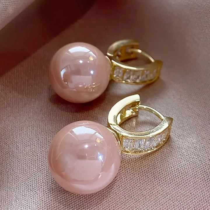 Vergulde damesoorbellen met roze parel - Alina