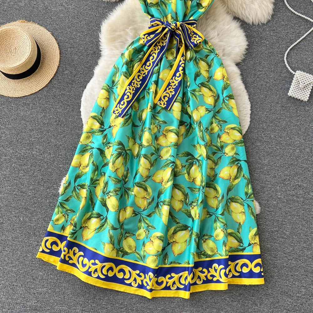 Lange vintage jurk met citroenprint en strik - Élodie