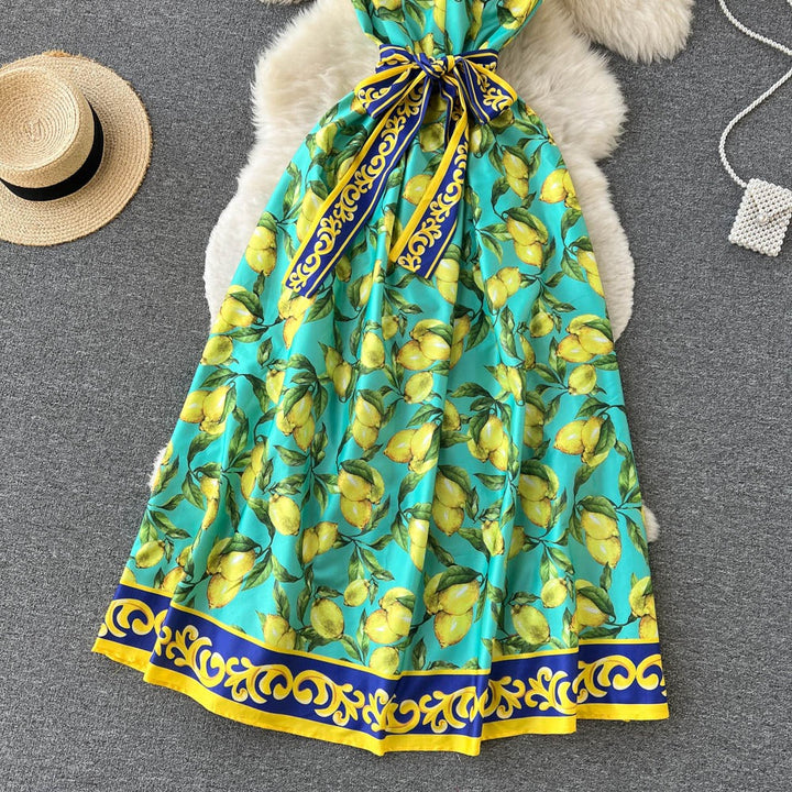 Lange vintage jurk met citroenprint en strik - Élodie