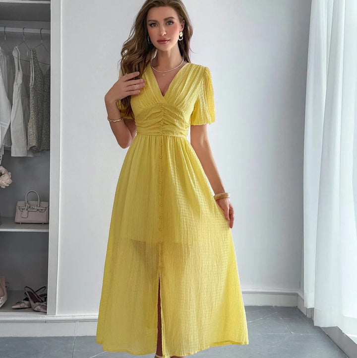 Lange damesjurk met elegante gekruiste halslijn en split aan de voorkant - Dalia