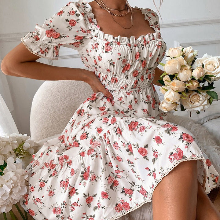 Gebloemde midi-jurk met pofmouwen in vintage stijl - Julieta