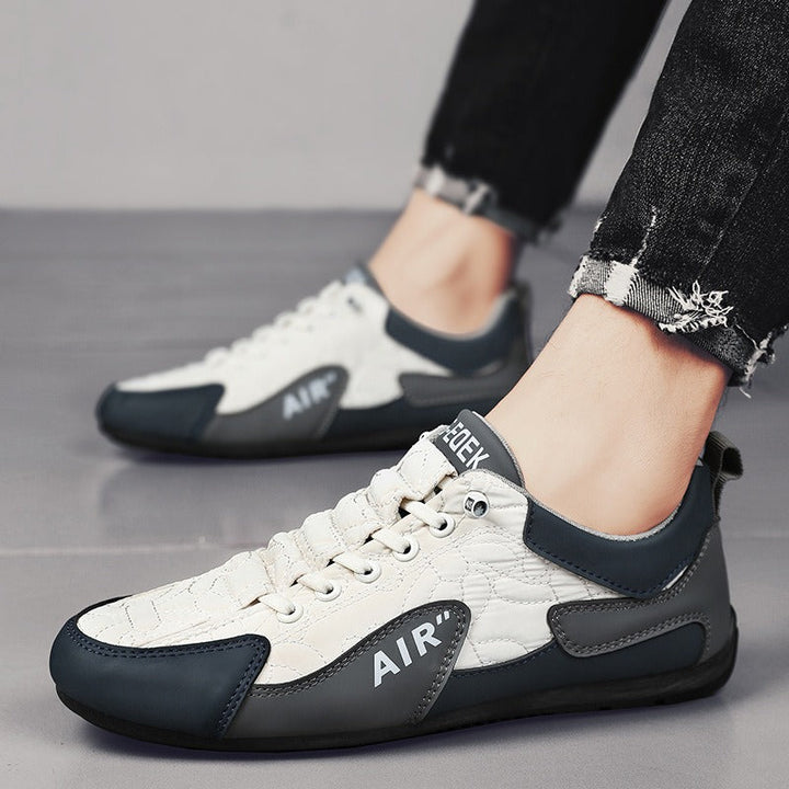 Herentrainers met contrasterende details en flexibele zool - Bastien