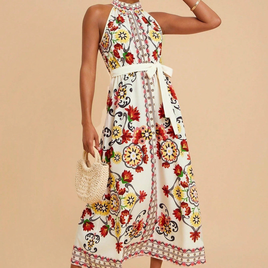 Mouwloze midi-jurk met halternek en bloemenprint - Carmela