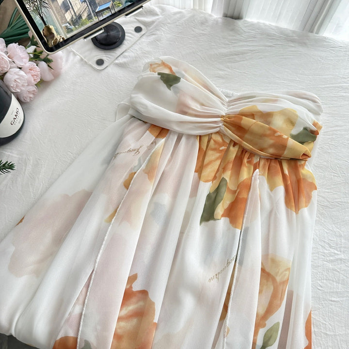 Lange damesjurk in chiffon met bloemenprint en open rug - Camille