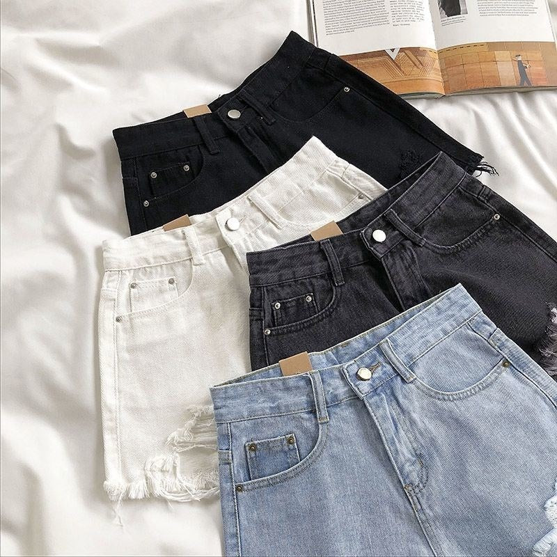 Damesshort van denim met gerafeld effect - Estelle