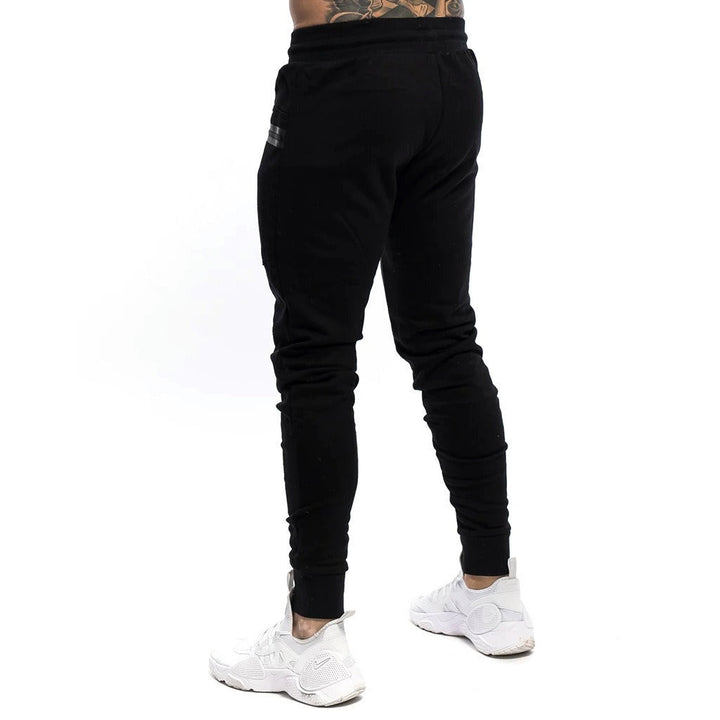 Technisch gebreide heren sportbroek, slim fit - Finn
