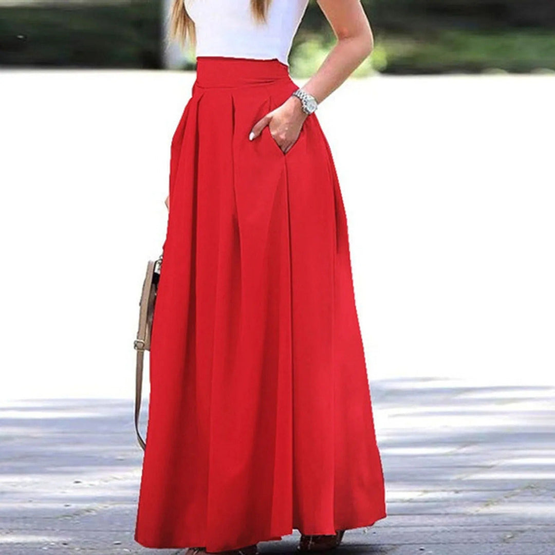 Elegante en vloeiende plooirok met hoge taille, ideaal voor een geraffineerde en vrouwelijke look