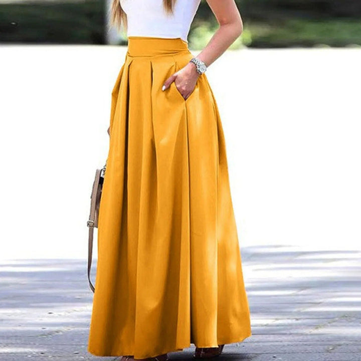 Elegante en vloeiende plooirok met hoge taille, ideaal voor een geraffineerde en vrouwelijke look