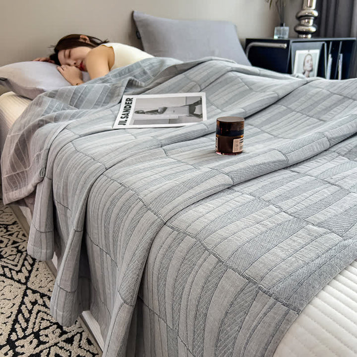 Gestreepte katoenen mousseline sprei