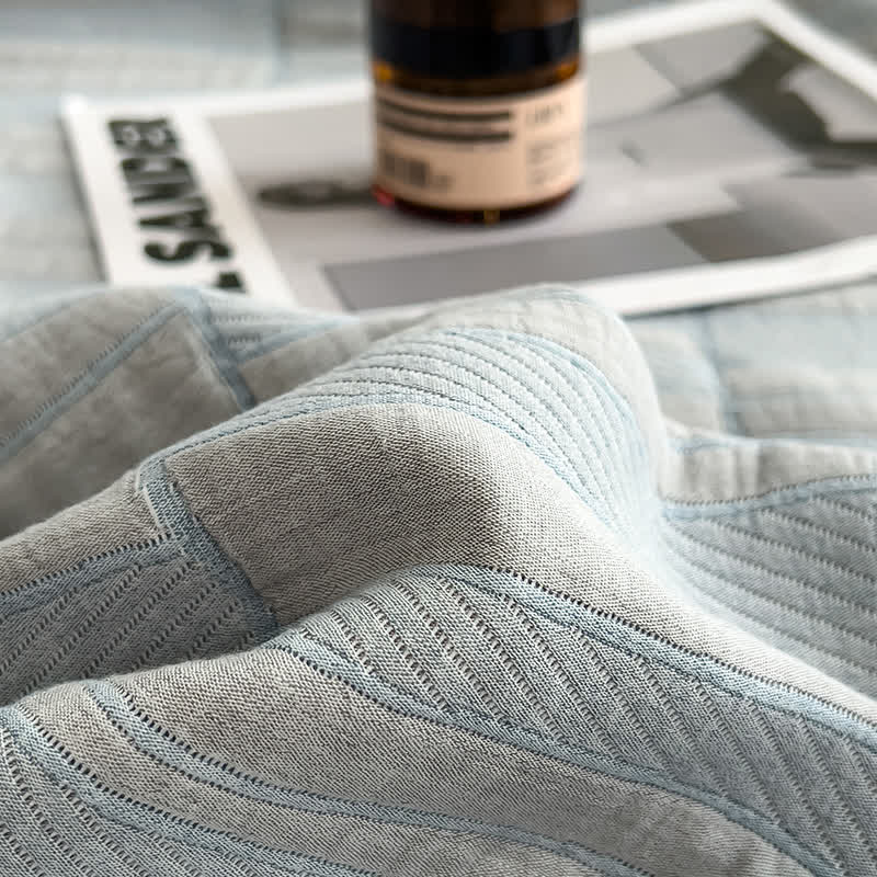 Gestreepte katoenen mousseline sprei